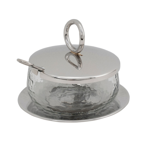 A silver plated sugar holder with spoon
