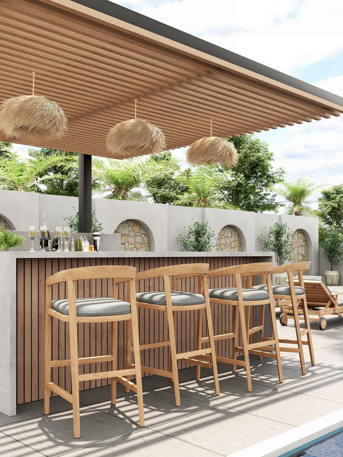 Outdoor bar with high stools next to a pool