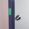 Magnetic evacuation door marker with bold “CHECKED” text for metal doors and frames