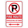 Mississauga FR-1 fire route sign with vehicles will be towed warning and double directional arrow