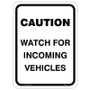 Caution Incoming Vehicles Sign prominently displayed in a high traffic area.