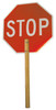 Reflective hand-held stop sign for traffic control and construction safety.