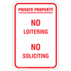 No Loitering No Soliciting Sign posted at the entrance of a commercial building to deter unwanted disturbances and maintain security.