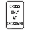 Cross only at Crosswalk Sign RA-8 restricts pedestrian crossings to designated safe locations.
