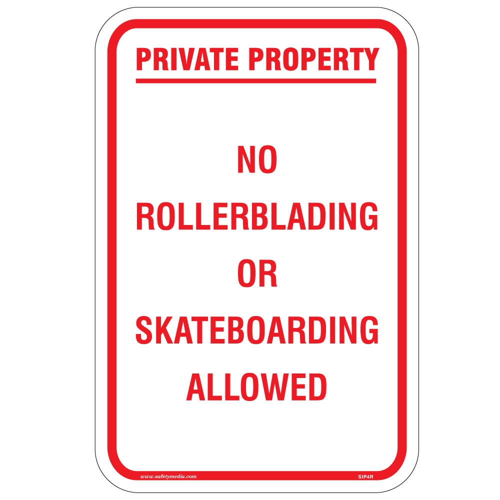 No Rollerblading Or Skateboarding Allowed Sign clearly displayed in a public area to enhance pedestrian safety.