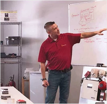 Instructor leading a fire and life safety training session