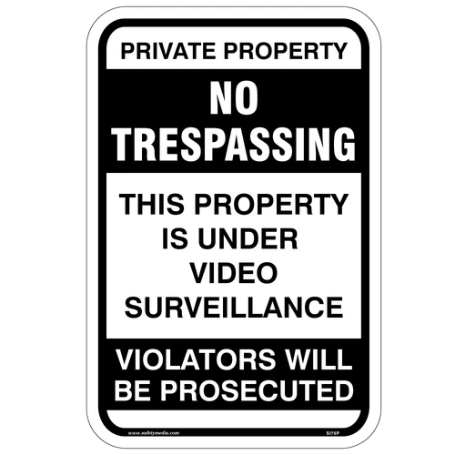 No Trespassing/Surveillance Sign at the entrance of a private property