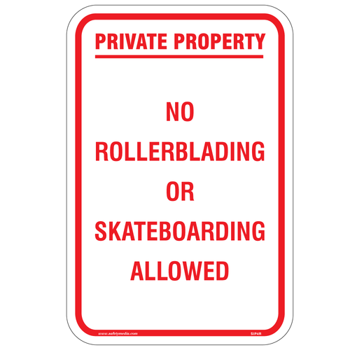 No Rollerblading Or Skateboarding Allowed Sign clearly displayed in a public area to enhance pedestrian safety.