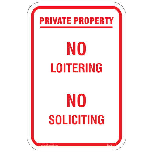 No Loitering No Soliciting Sign posted at the entrance of a commercial building to deter unwanted disturbances and maintain security.