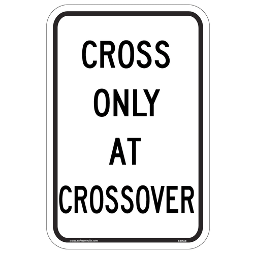 Cross only at Crosswalk Sign RA-8 restricts pedestrian crossings to designated safe locations.