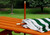 umbrella laying on picnic table