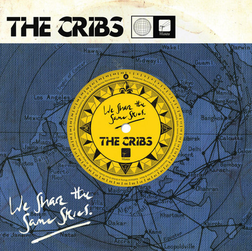 The Cribs – We Share The Same Skies (2 track 7 inch single used UK 2009 blue translucent vinyl NM/NM)