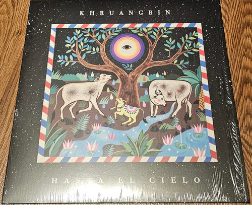 Khruangbin – Hasta El Cielo (LP + 2 track 7 inch single used US 2019...LP on blue sky coloured 180 gm vinyl in open shrink NM-/NM-)