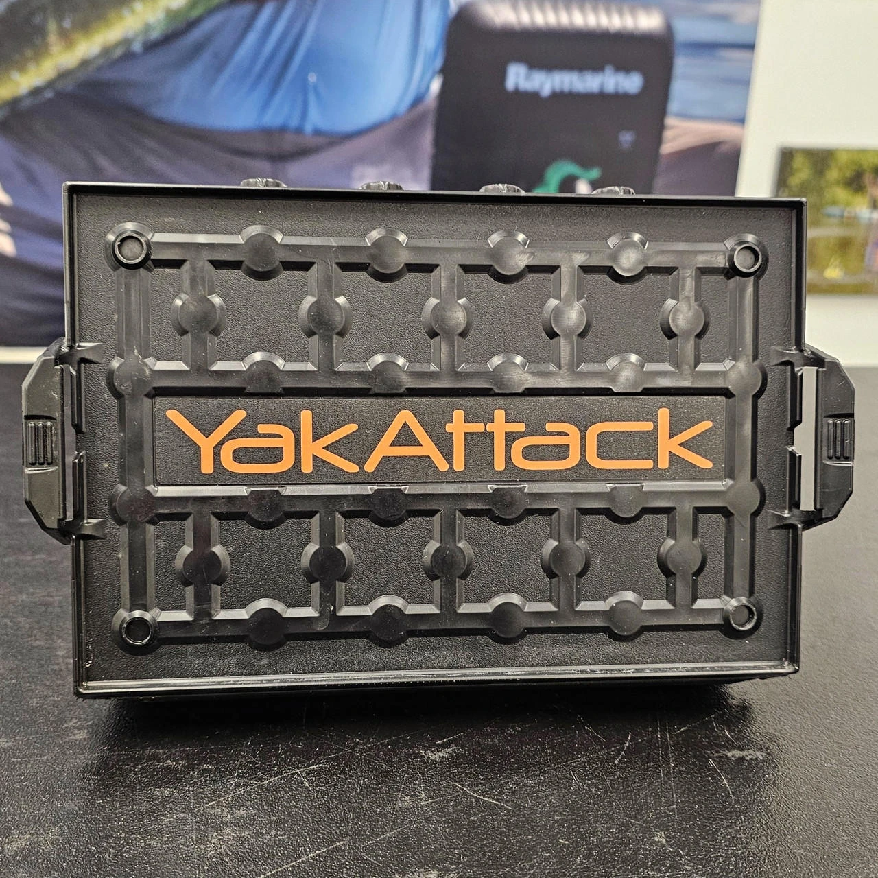Front view of the YakAttack Logo BlackPak Side Panel Decal, Orange, 7" x 1.13" on TracPak
