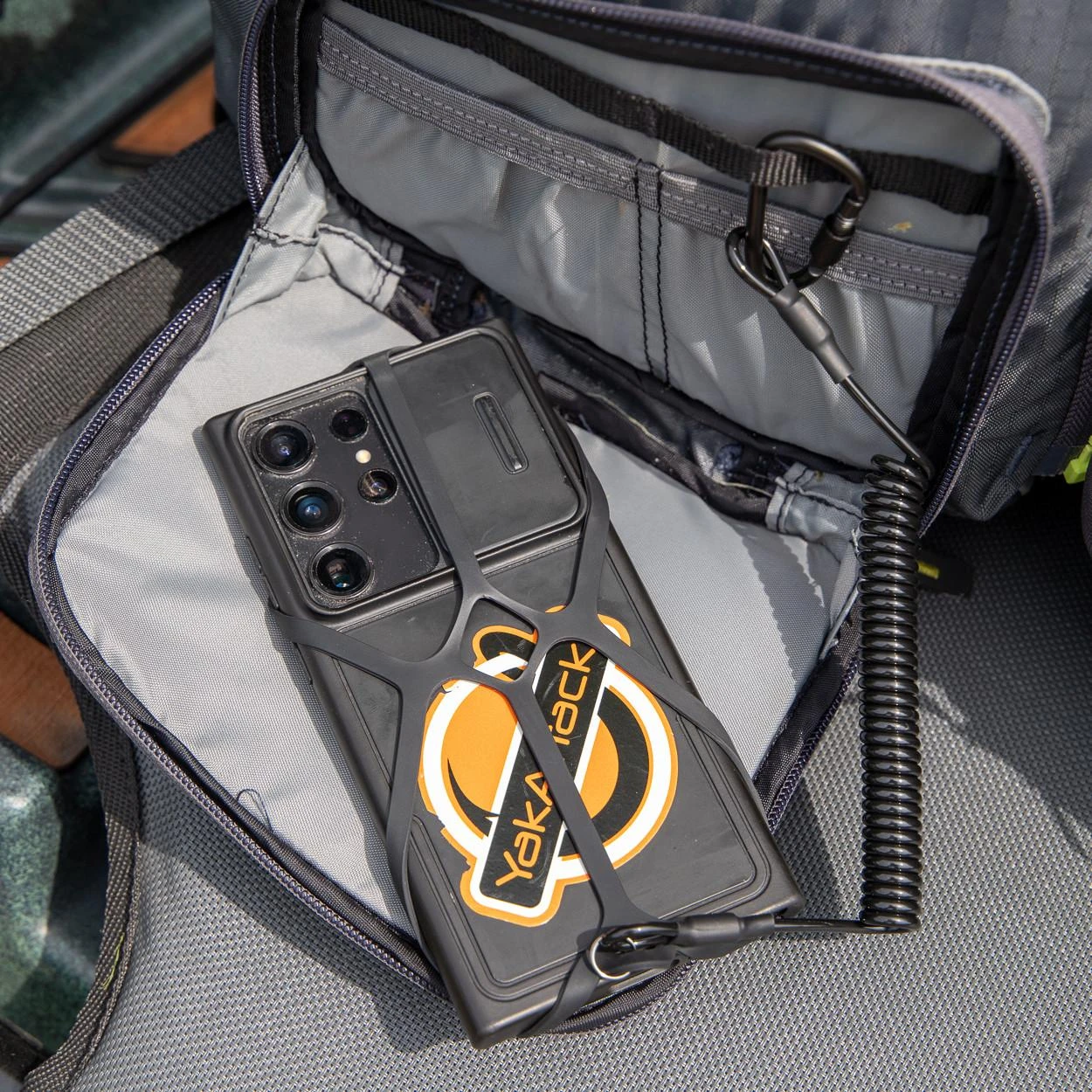 Universal Smartphone Harness with Tether, Black upside down on PFD (2)