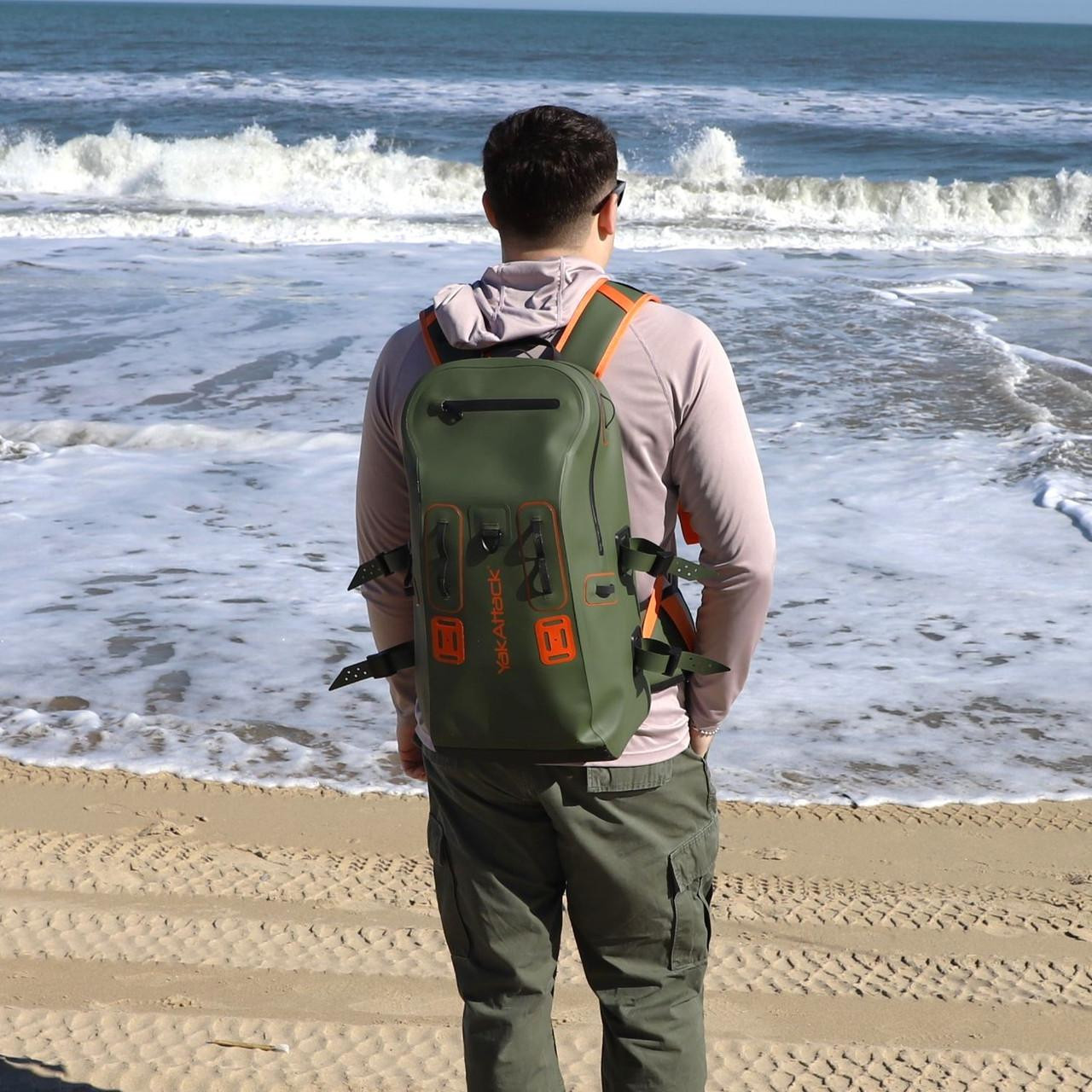 Lifestyle picture of the 28L BackWater DryPak, Waterproof Backpack, Green/Orange, Includes TetherTubes in used
