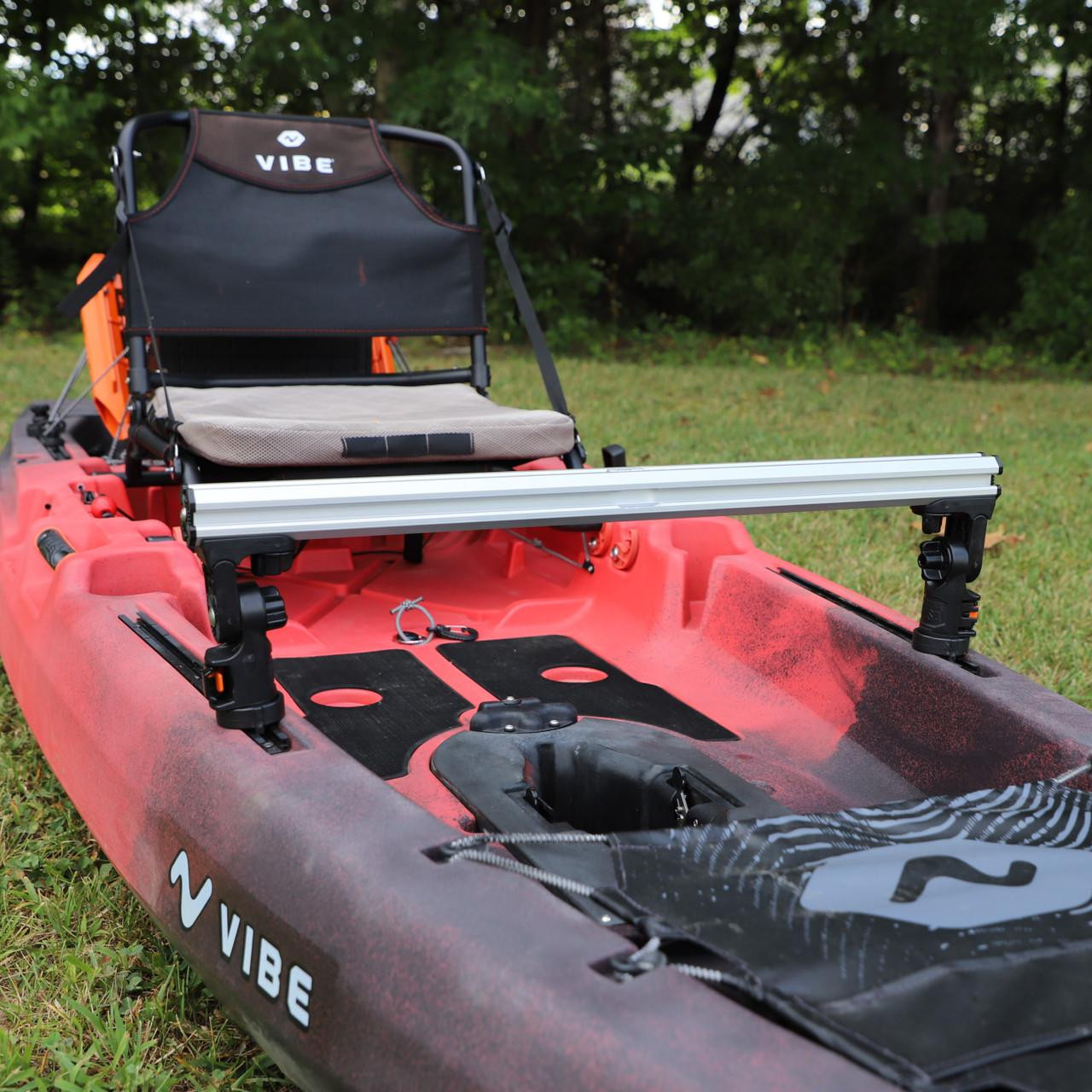 Lifestyle front picture of the Command Center CrossBar, with Track Mounted LockNLoad™ Mounting System on kayak