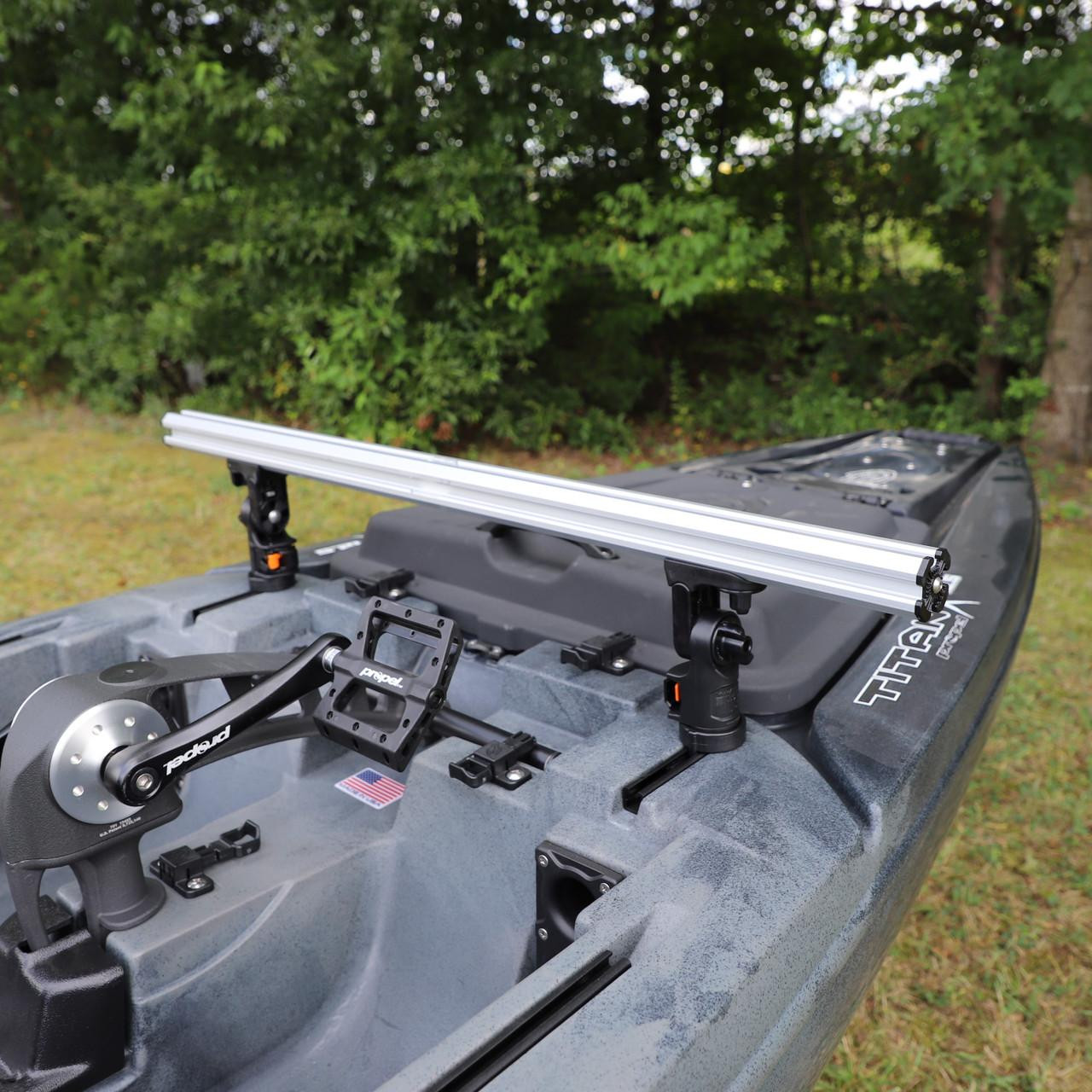 Lifestyle back picture of the Command Center CrossBar, with Track Mounted LockNLoad™ Mounting System on kayak