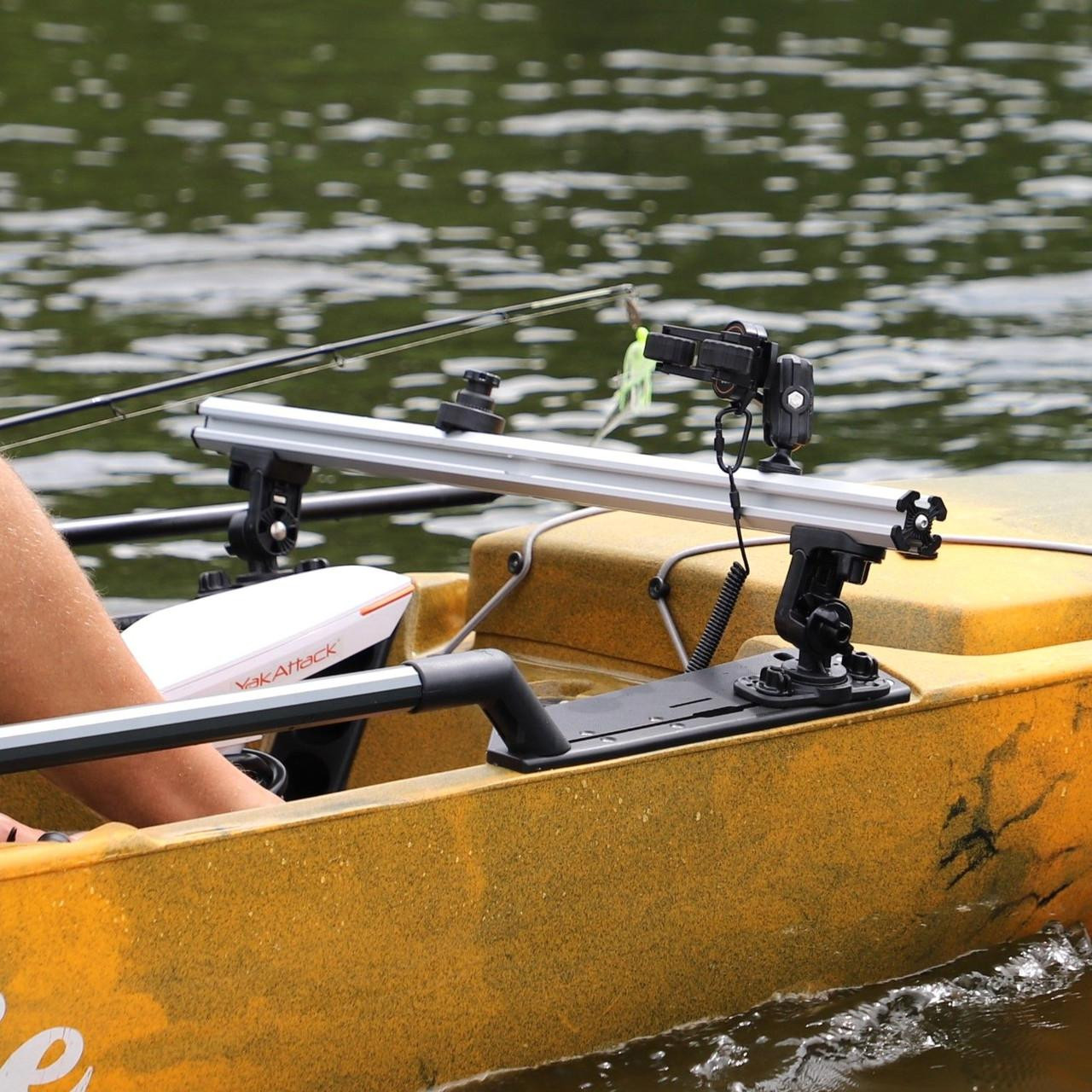 Lifestyle picture of the Command Center CrossBar, with Zero Play LockNLoad™ Track Mount Adapter on kayak on the water