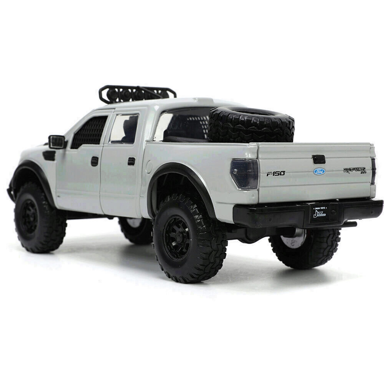 2011 Ford F-150 SVT Raptor w/Tire Rack Diecast Model Truck