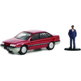 1989 Ford Taurus with Sales Associate in Suit Main Image