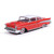 1957 Chevrolet Bel Air Sedan - Matador Red and India Ivory 1:64 Scale Diecast Model Car by IXO Models Main Image
