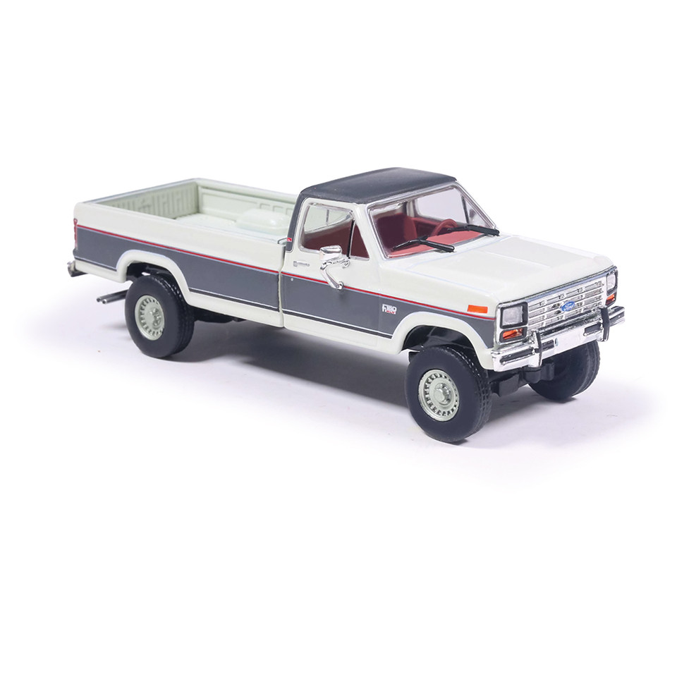 1986 Ford F-150 XLT Lariat Long Bed Styleside 4X2 - Colonial White Tu-Tone 1:64 Scale Diecast Model Truck by IXO Models Main Image