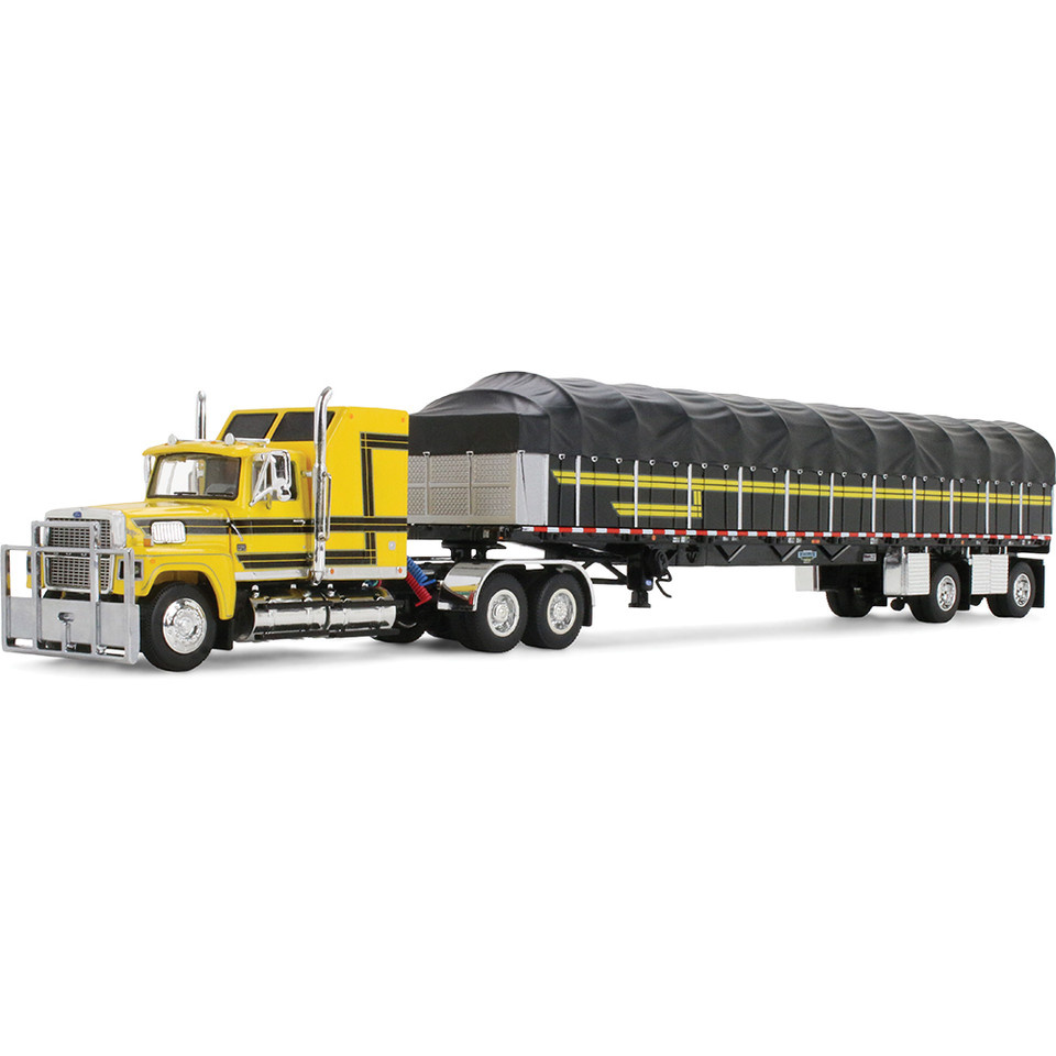 Ford LTL 9000 with 60" Aerodyne Sleeper & 53' Wilson Roadbrute Flatbed Trailer with Covered Wagon Main Image