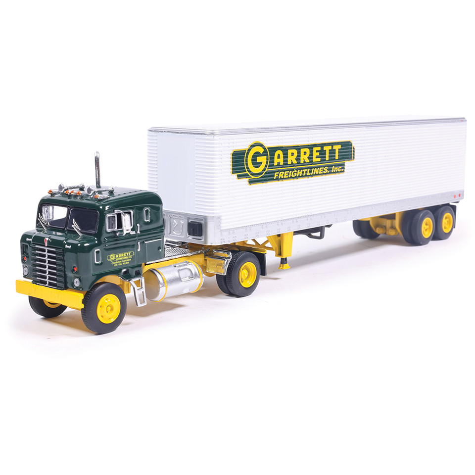 1950 Kenworth Bullnose Garrett Freightlines & Vintage Trailer - Yellow and Green 1:64 Scale  by IXO America Main Image
