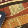 Geometric Decorative Stripes | Red / Orange / Brown | Upholstery Fabric | 60 W