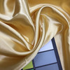 light gold poly satin fabric