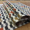 Dahra in Caviar | Jacquard Upholstery Fabric | Color-blocked Ikat in Beige, Gray, Orange, Brown | 54" Wide | By the Yard