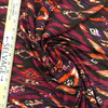 Magenta And Orange Ikat Flame Stitch | Lightweight Printed Jersey Knit Stretch Fabric | Clothing and Apparel | By the Yard | 60 inch Wide