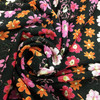 Pink and Orange Daisy Chain On Black | Lightweight Jersey Knit Stretch Fabric | Clothing and Apparel | By the Yard | 60 inch Wide