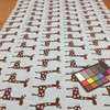 Giraffes in Brown and Blue | Home Decor Fabric | Baby / Juvenile Drapery | 54" Wide | By the Yard | Premier Prints