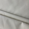 Alice in Stucco | Faux Leather Vinyl Upholstery Fabric | Medium Grain | Solid Light Beige | Heavy Weight | 54" Wide | By the Yard