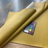Naugahyde Spirit in Goldenrod Yellow | Faux Leather Upholstery Vinyl Fabric | Solid Matte | Heavyweight | Knit Backed | 54" Wide | Sold BTY