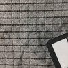 black and white square textured woven fabric