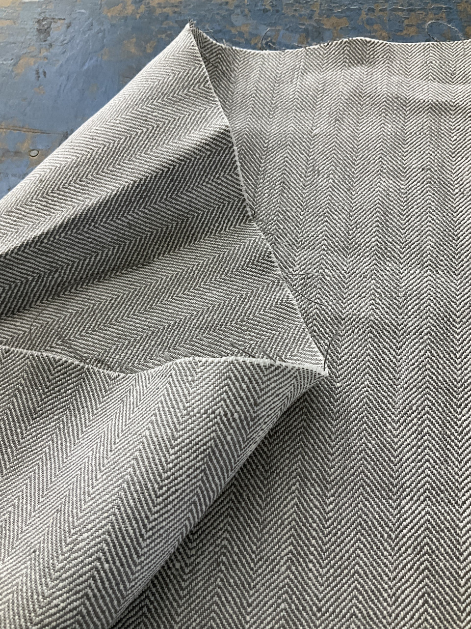 Premium Photo  Grey linen fabric for sewing clothes and other things linen  fabric for the production of various kinds of goods