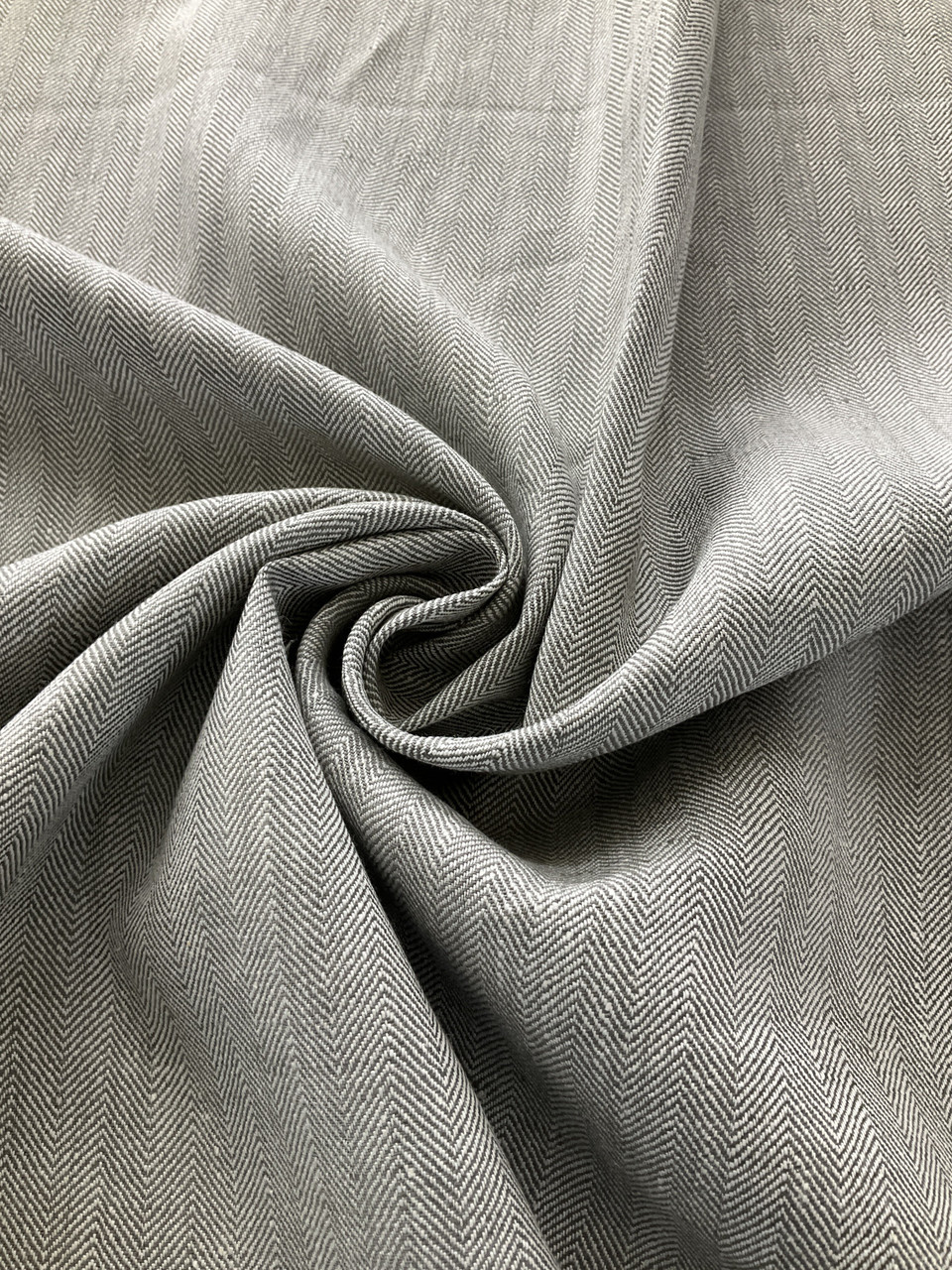 Premium Photo  Grey linen fabric for sewing clothes and other things linen  fabric for the production of various kinds of goods