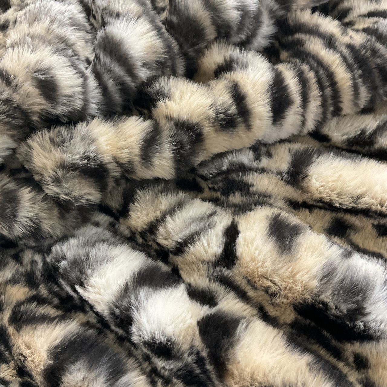 Faux Fur fabric, with a pile to it,with embroidered floral motifs, for  costumes