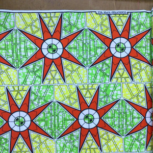 Starburst | Green / Yellow / Red | Present Holland Wax | Quilting Fabric | 100% Cotton | 44" Wide | By the Yard