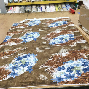 Blue Floral on Brown Animal Print Jersey Knit Print Fabric | Clothing and Apparel | 48 inch Wide | By The Yard
