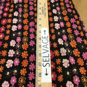 Pink and Orange Daisy Chain On Black | Lightweight Jersey Knit Stretch Fabric | Clothing and Apparel | By the Yard | 60 inch Wide