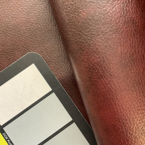 Oregon Trail in Bourbon Red Brown | Faux Leather Upholstery Fabric | Light Pebbled Grain | Vinyl | Heavy Weight / Durable | 54" Wide | By the Yard