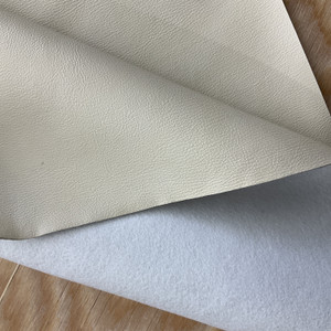 Alice in Stucco | Faux Leather Vinyl Upholstery Fabric | Medium Grain | Solid Light Beige | Heavy Weight | 54" Wide | By the Yard