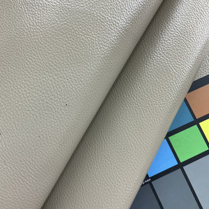 Churchill Downs in Pebble | Faux Leather Upholstery Vinyl Fabric | Greyish Taupe | Suede Backed | Extra Heavy | Kaufmann | 54" Wide | Sold BTY.