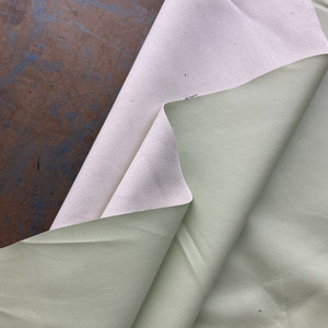 Castillo in Pistachio Green | Faux Leather Vinyl Upholstery Fabric | Light Grain | Workable | 54" Wide | By the Yard