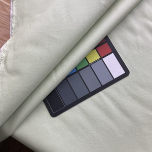 Castillo in Pistachio Green | Faux Leather Vinyl Upholstery Fabric | Light Grain | Workable | 54" Wide | By the Yard