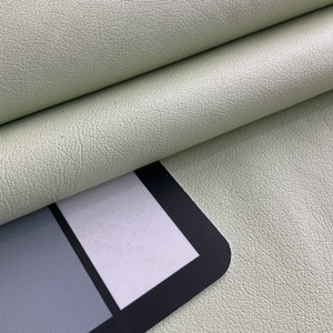 Castillo in Pistachio Green | Faux Leather Vinyl Upholstery Fabric | Light Grain | Workable | 54" Wide | By the Yard